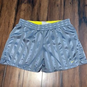 grey striped nike running shorts